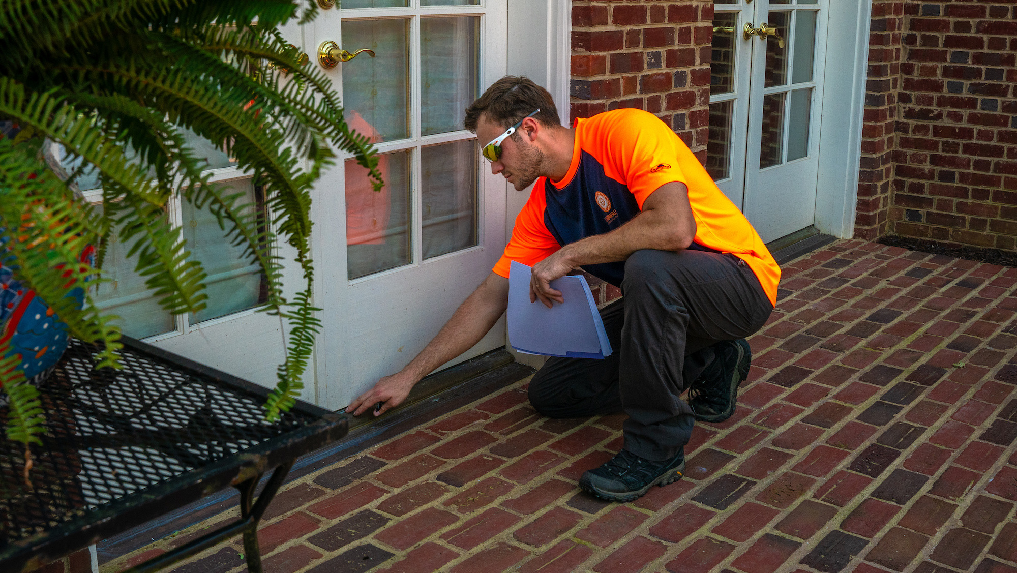 pest control technician doing inspection