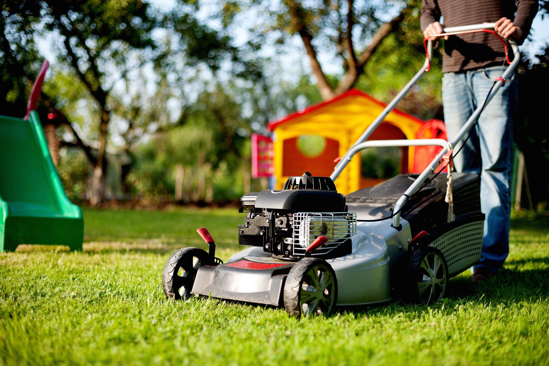 lawn mower mowing grass homeowner